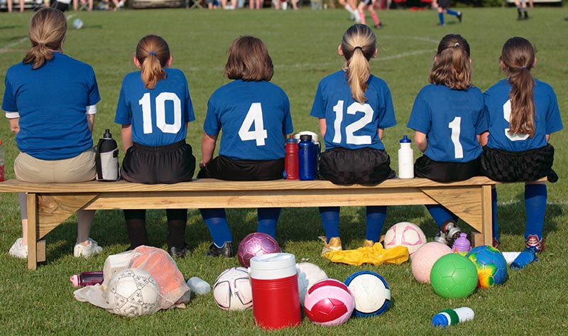Youth Soccer Players Sitting on the Bench Youth Soccer Players Sitting on the Bench